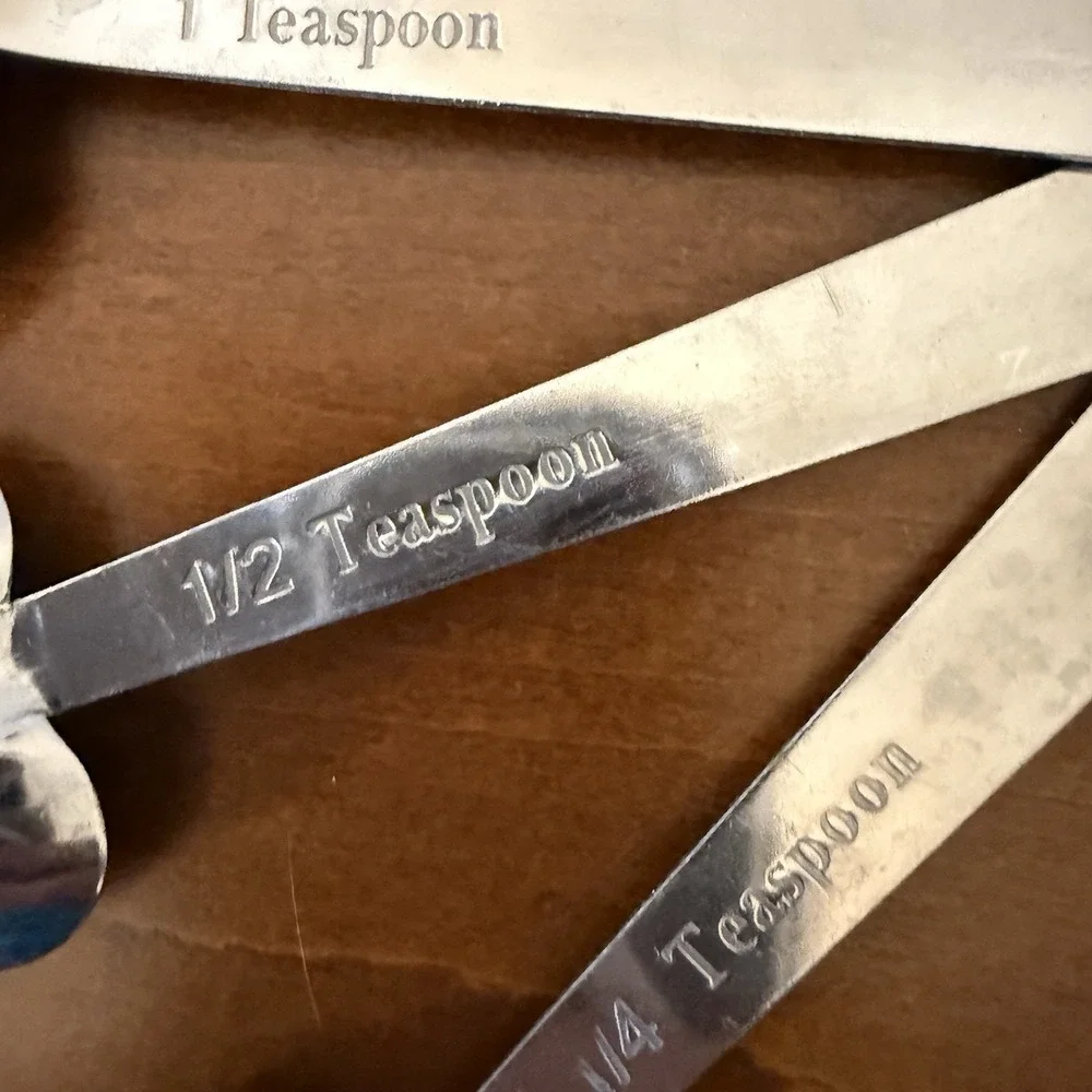 Set of 4 Stainless Steel Heart Shaped Measuring Spoons with Phrases